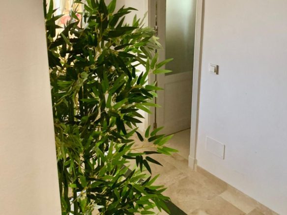 Interior hallway inside a duplex apartment in San Roque Club Sotogrande.