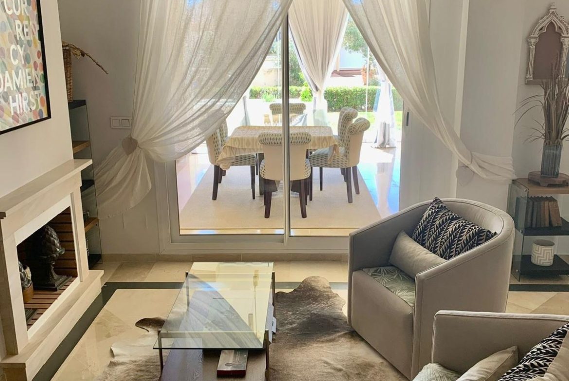 Spacious living room interior in a furnished duplex apartment in San Roque Club Sotogrande.