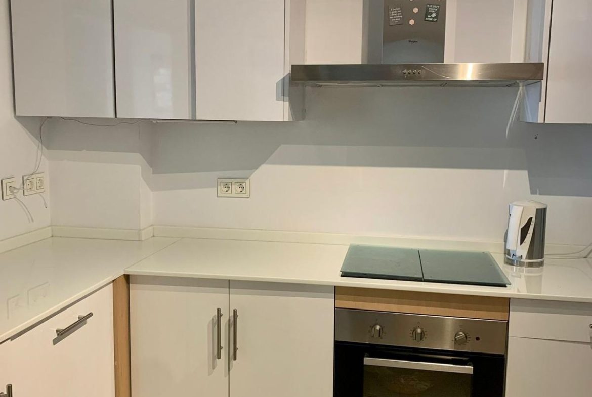 Modern kitchen with appliances in a duplex apartment in San Roque Club Sotogrande.