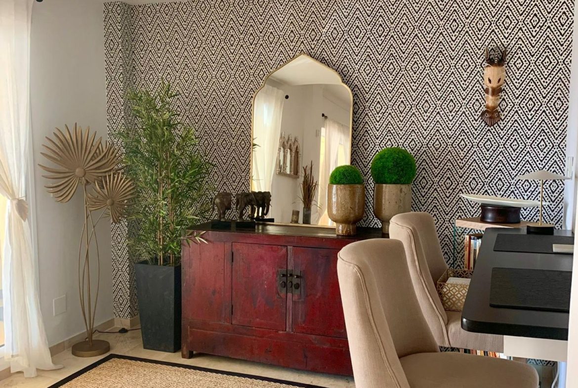 Dining area inside a furnished duplex apartment located in San Roque Club Sotogrande.