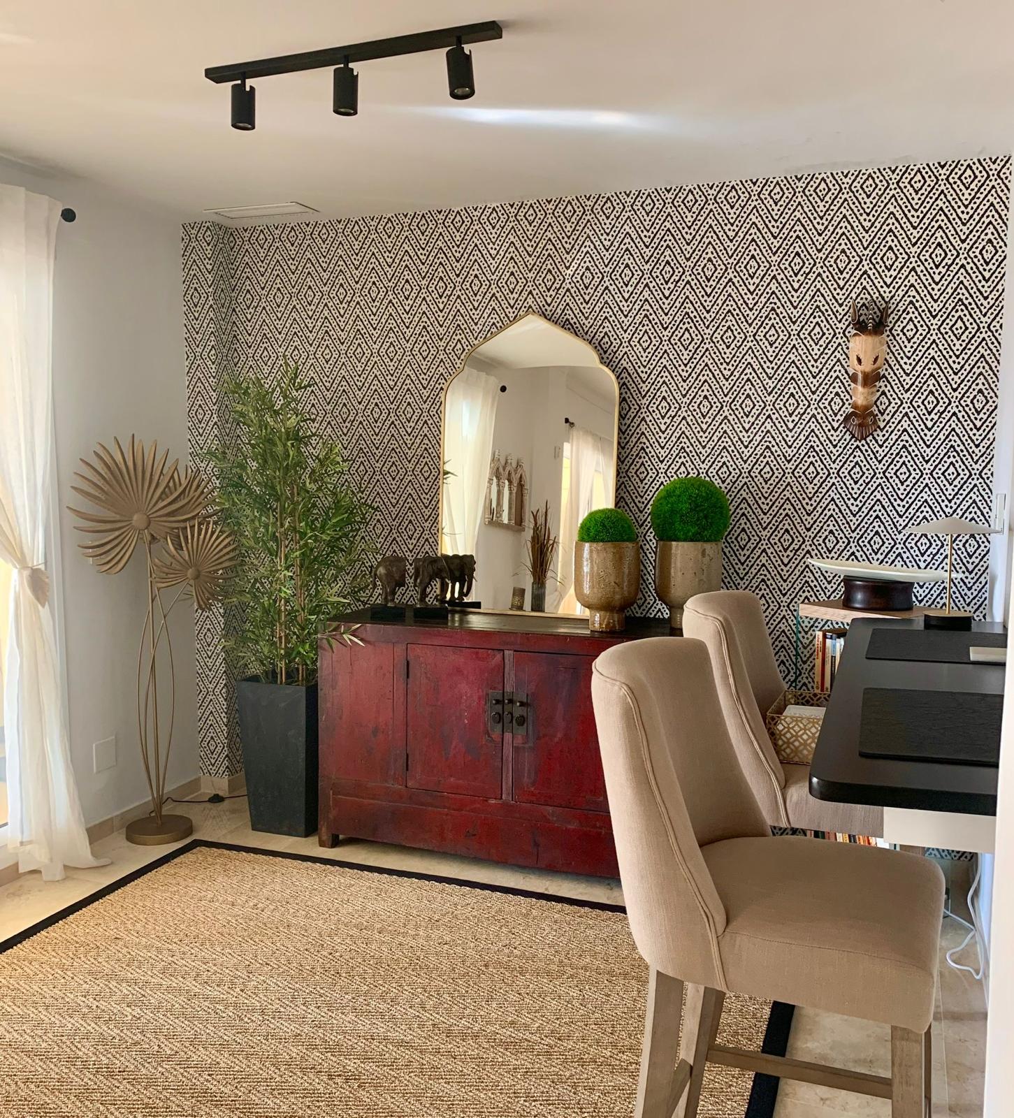 Dining area inside a furnished duplex apartment located in San Roque Club Sotogrande.