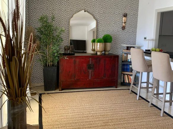 Open plan living and dining room inside a duplex apartment in San Roque Club Sotogrande.